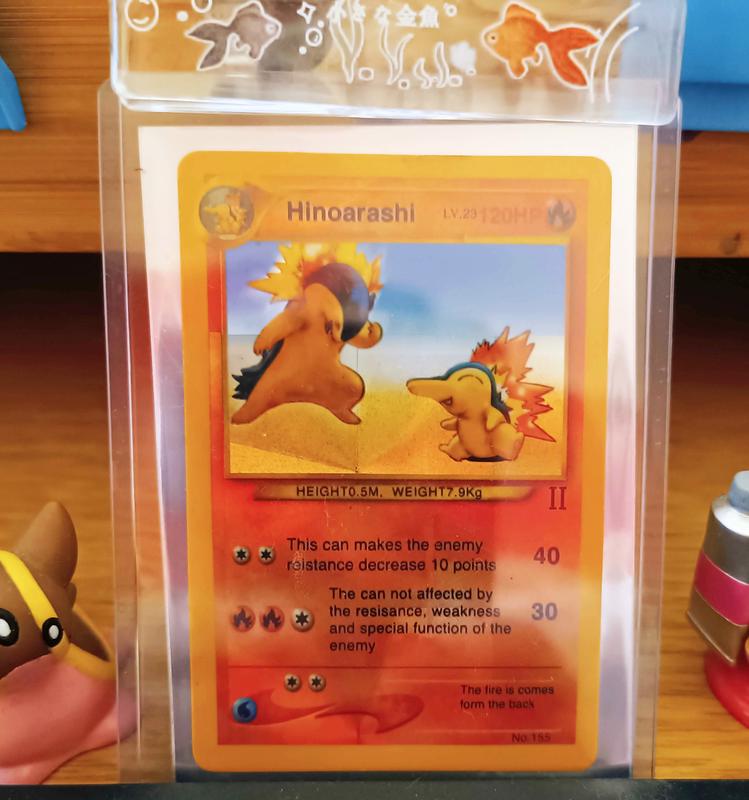 A bootleg card of Cyndaquil, given to Takoto by his friend