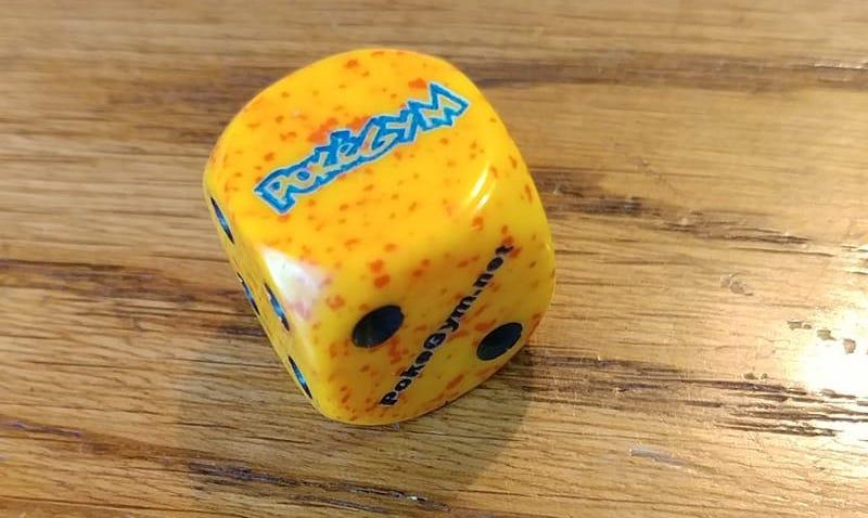 A PokéGym branded die