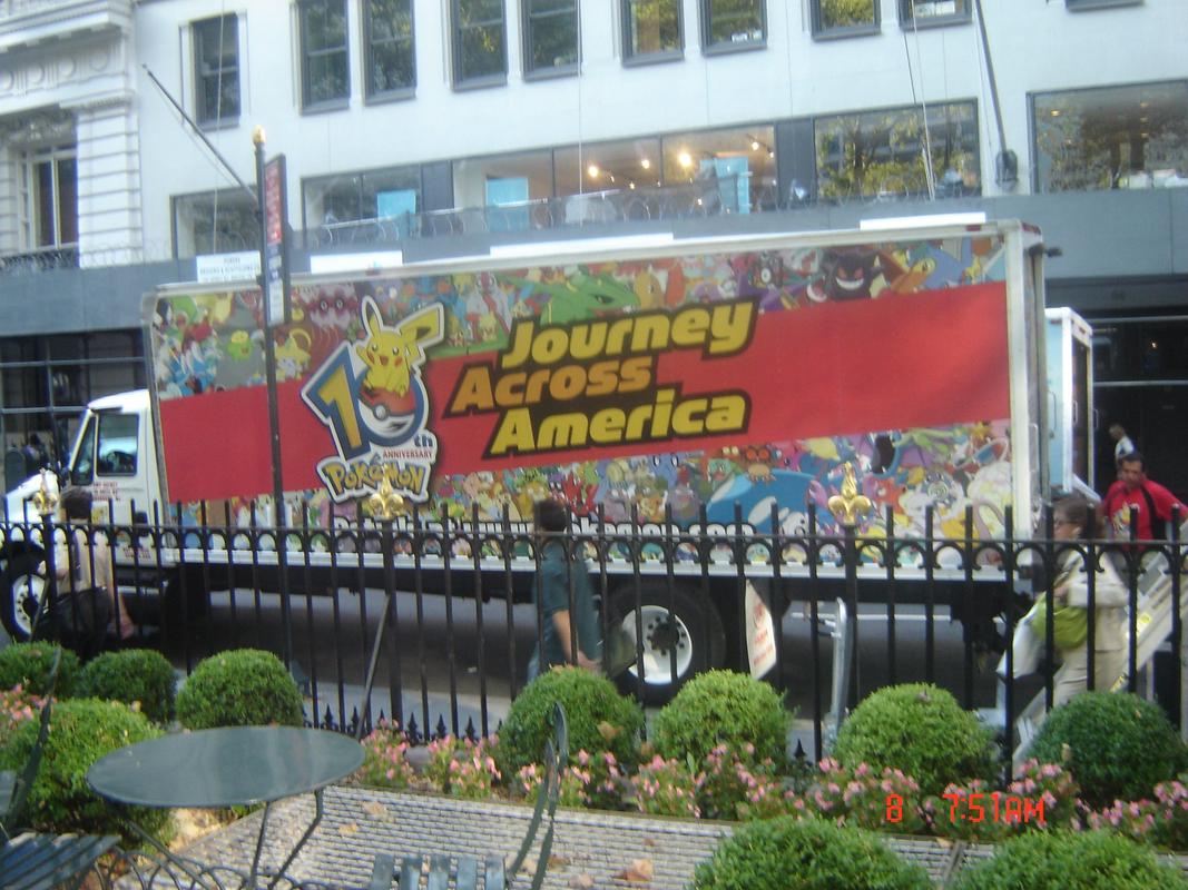A truck featuring the Journey Across America branding, likely used to transport items to and from the event