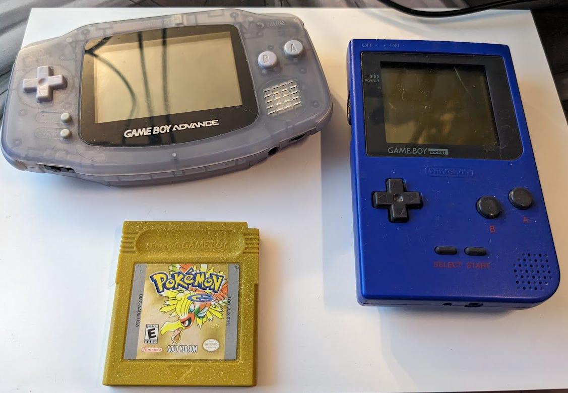 Faeore sent us some photographs of items from her childhood, around the time of hosting the website. Here is her Game Boy Advance, Game Boy Pocket, and her copy of Pokémon Gold!