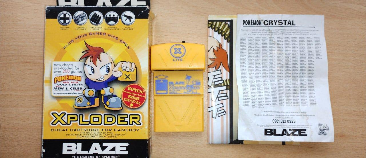 My original Blaze Xploder Lite cheat cartridge, box, and cheat sheets that gave me an unfair (yet fun) advantage against my friends in Pokémon Blue and Pokémon Crystal