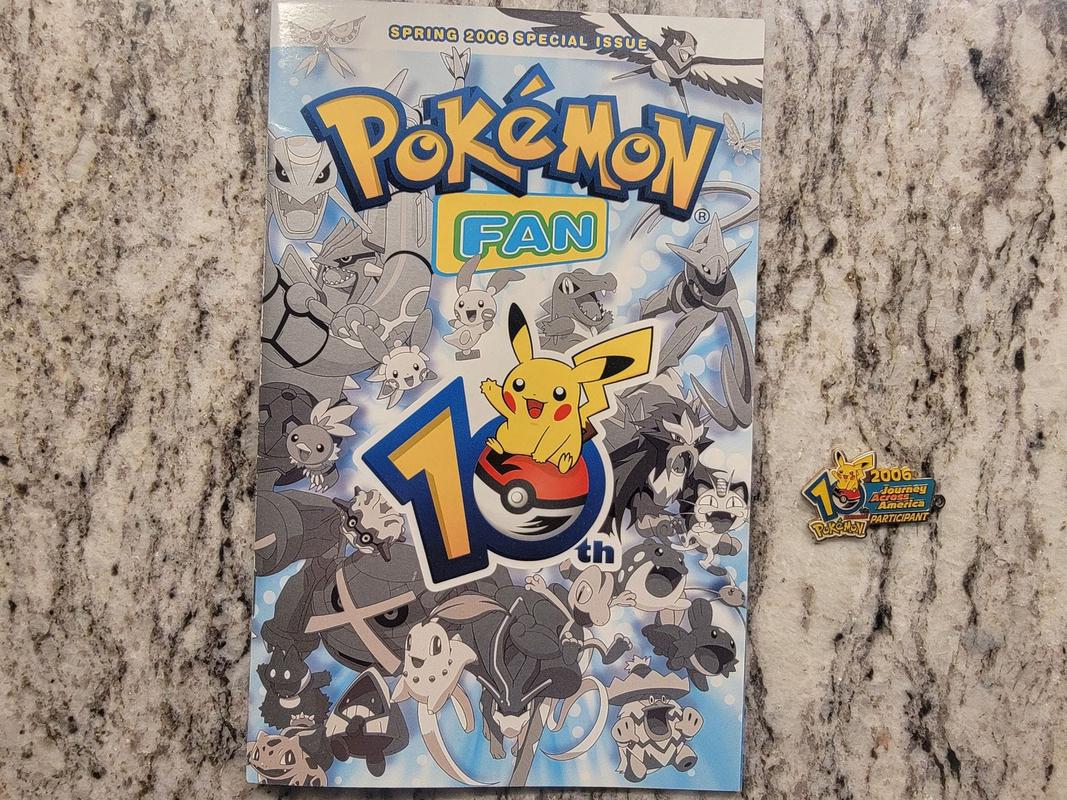 nza's Pokémon Journey Across America keychain from 2006, along with an issue of "Pokémon Fan" from Spring 2006