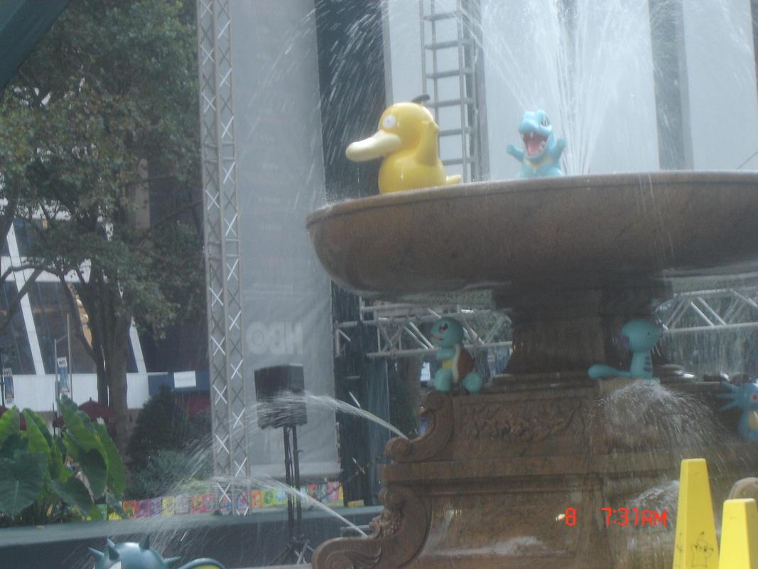 Statues from the original Pokémon Center New York store made an appearance across Bryant Park that day. In this photo, we can see Psyduck, Totodile, Squirtle, Wooper, Horsea, and Qwilfish around the fountain