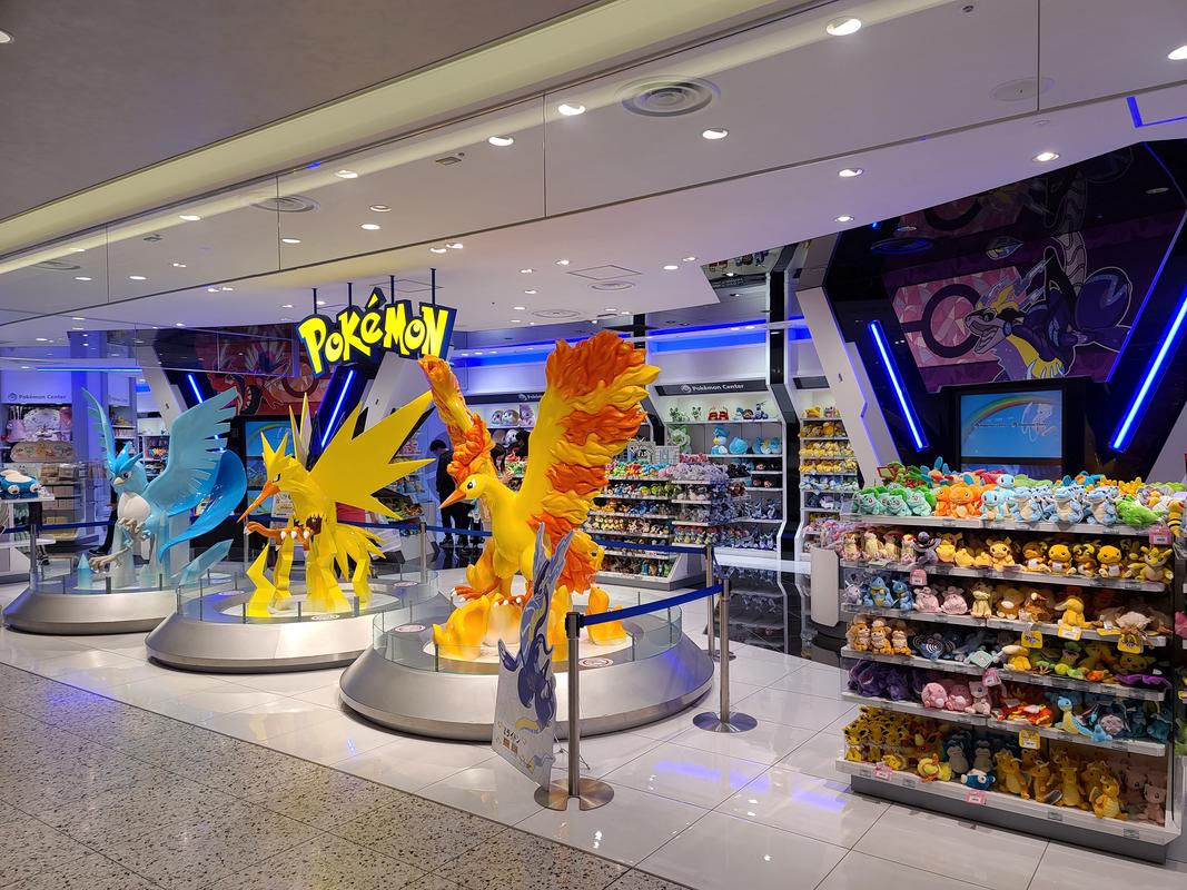 The three legendary birds of Kanto dominate the space at the Osaka DX Pokémon Center